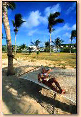 relax on the beach at  the Tamarind Reef  Hotel